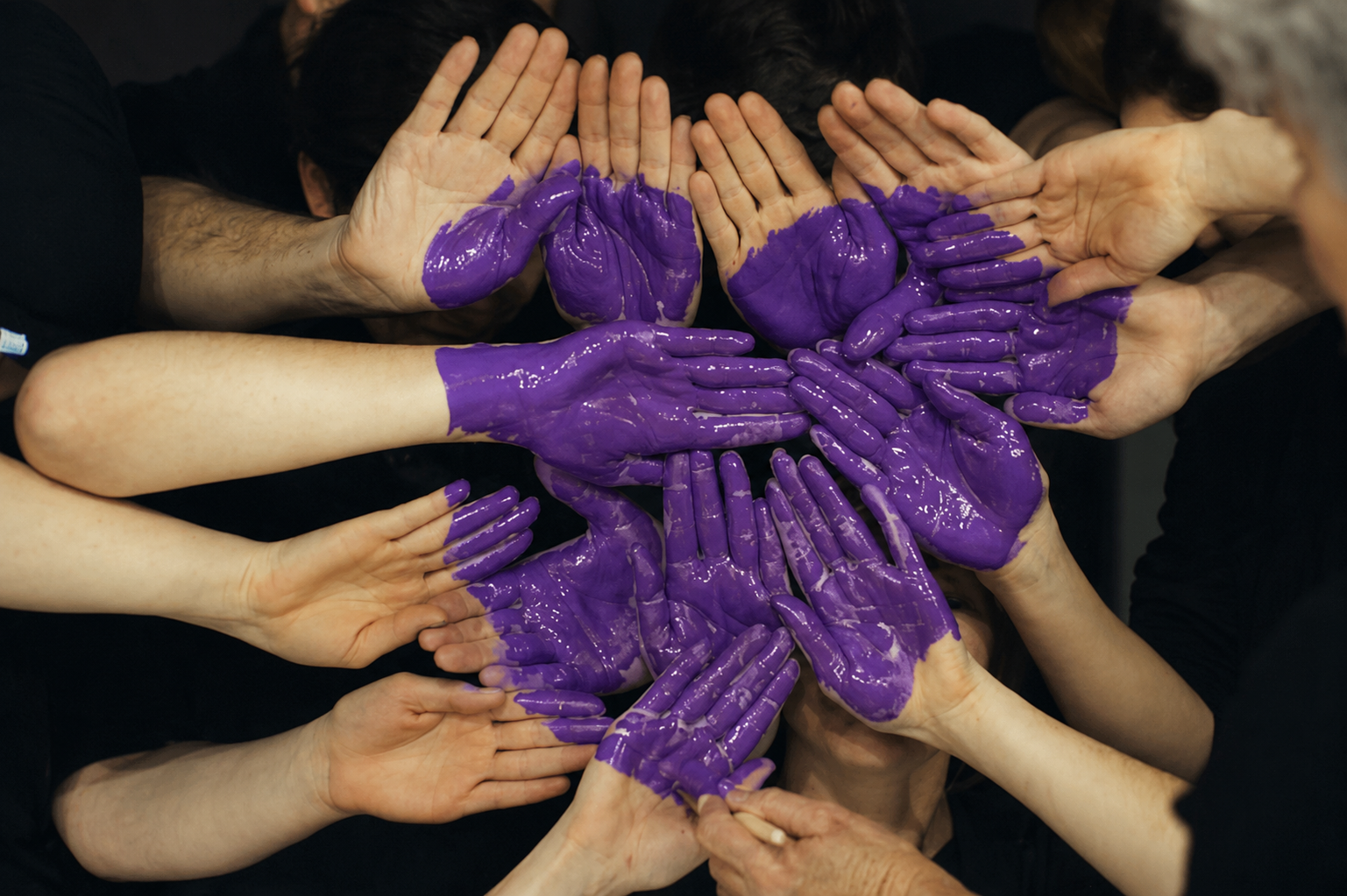 Community of hands coming together in support